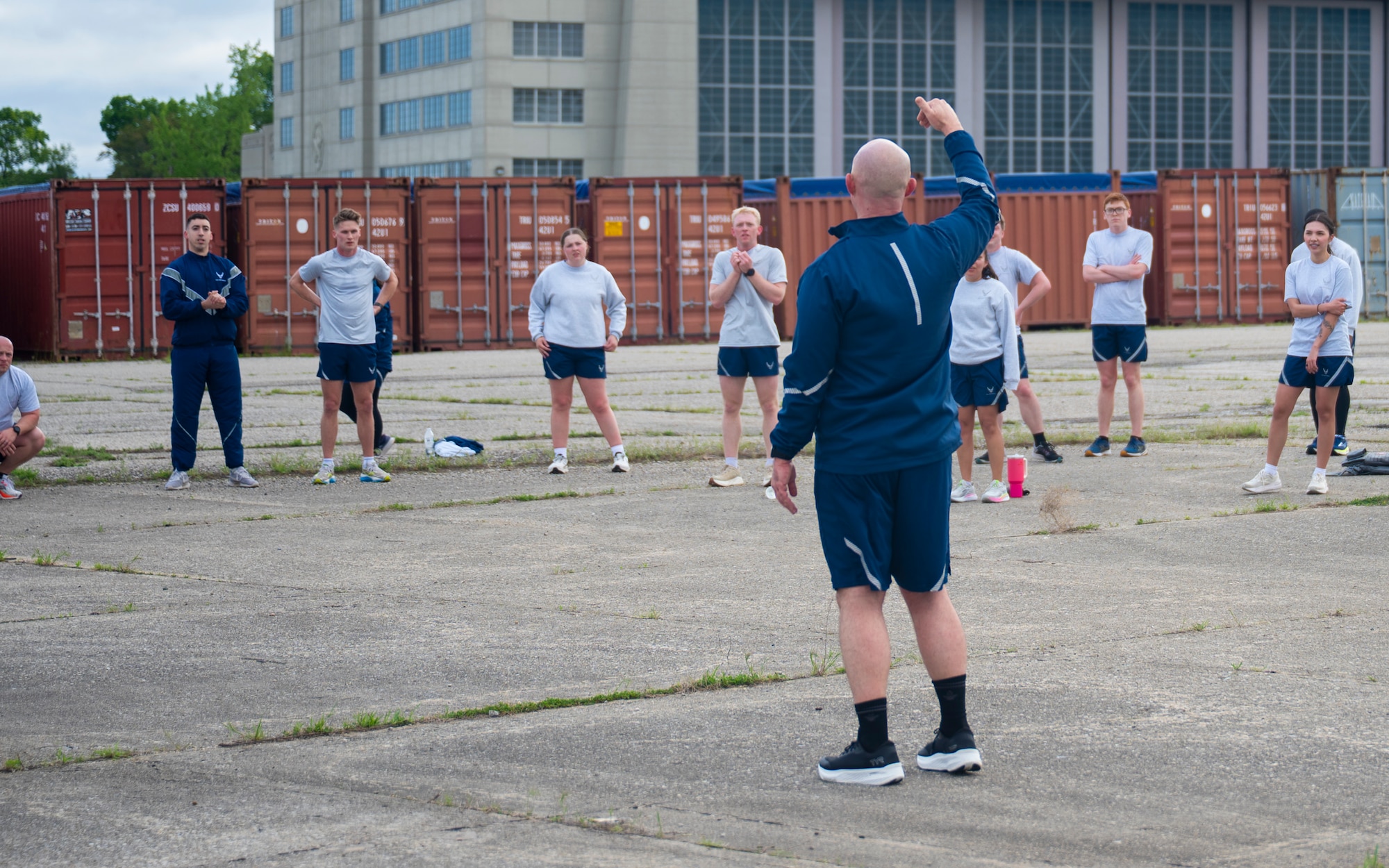Demonstrating a "fit to fight" mentality, Chief Master Sgt. Stefan Blazier, Deputy Chief of Staff for Intelligence senior enlisted leader, participates in a physical training session with Airmen from the National Air and Space Intelligence Center at Wright-Patterson Air Force Base, Ohio, April 30, 2026.