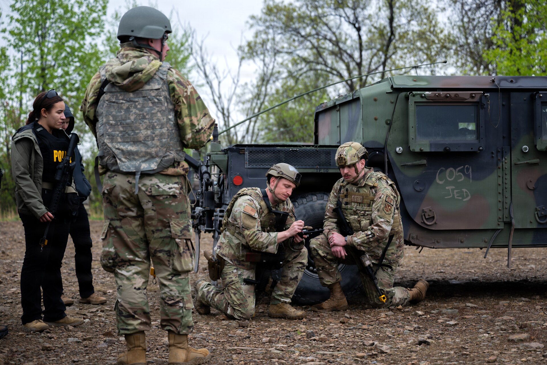 U.S. Airmen assigned to Joint Base Andrews, Maryland, participate in reconnaissance of a potential campsite during the 316th Wing’s Bivouac exercise at Fort Indiantown Gap, Pennsylvania, April 29, 2026. The exercise encompassed a simulated convoy with augmentees from other career fields to provide training on securing positions, engaging adversaries and conducting site reconnaissance. (U.S. Air Force photo by Airman 1st Class Patrick Njuguna)