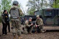 U.S. Airmen assigned to Joint Base Andrews, Maryland, participate in reconnaissance of a potential campsite during the 316th Wing’s Bivouac exercise at Fort Indiantown Gap, Pennsylvania, April 29, 2026. The exercise encompassed a simulated convoy with augmentees from other career fields to provide training on securing positions, engaging adversaries and conducting site reconnaissance. (U.S. Air Force photo by Airman 1st Class Patrick Njuguna)