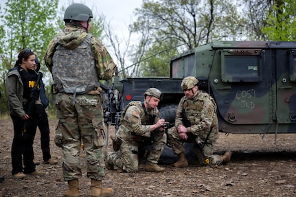 U.S. Airmen assigned to Joint Base Andrews, Maryland, participate in reconnaissance of a potential campsite during the 316th Wing’s Bivouac exercise at Fort Indiantown Gap, Pennsylvania, April 29, 2026. The exercise encompassed a simulated convoy with augmentees from other career fields to provide training on securing positions, engaging adversaries and conducting site reconnaissance. (U.S. Air Force photo by Airman 1st Class Patrick Njuguna)