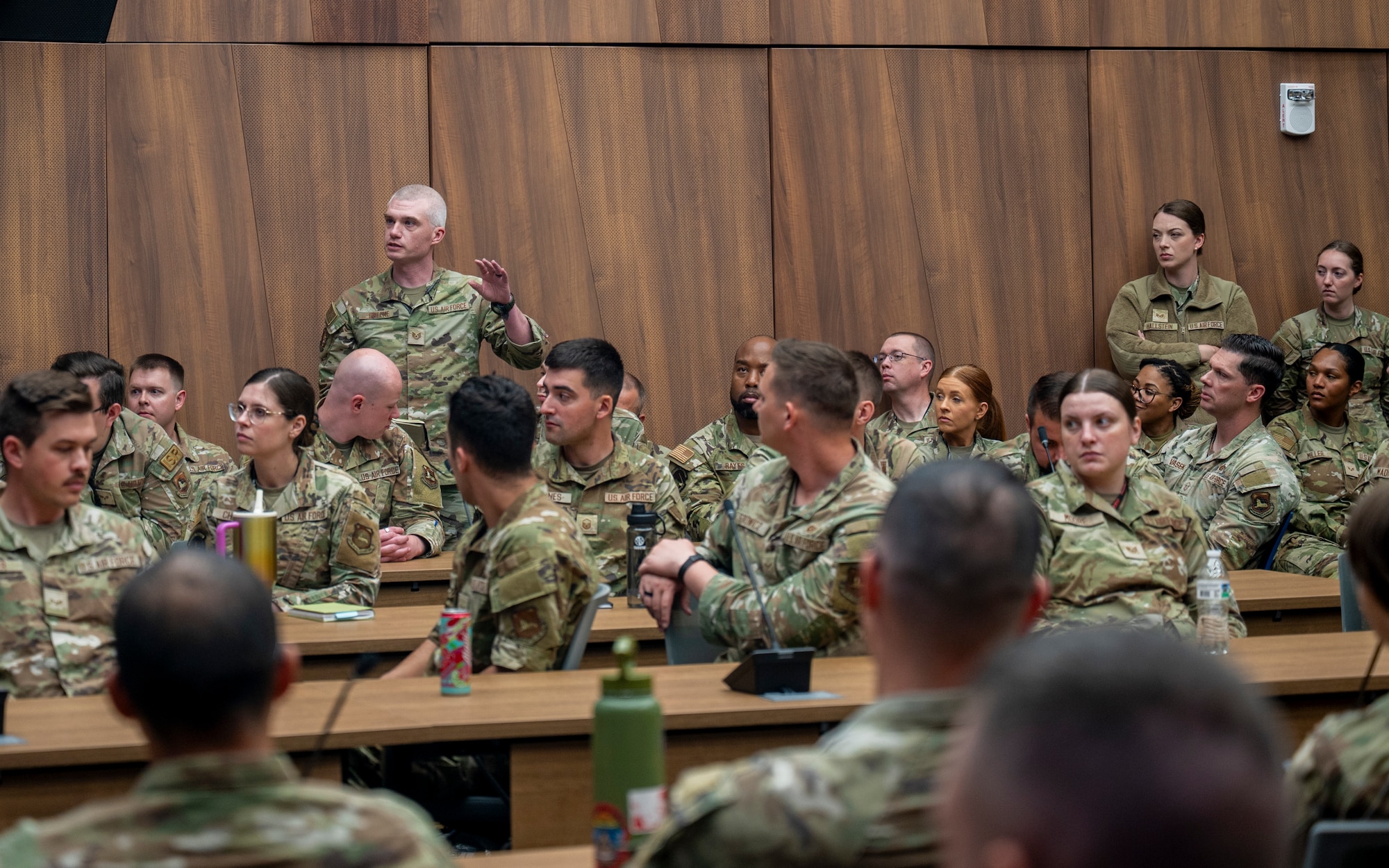 Tech. Sgt. Jonathan Greene, National Air and Space Intelligence Center historian, asks a question during an enlisted all-call hosted by Chief Master Sgt. Stefan Blazier, Deputy Chief of Staff for Intelligence senior enlisted leader, and Chief Master Sgt. Tyler Smith, 1N/9L0/9S1 career field manager, at Wright-Patterson Air Force Base, Ohio, April 30, 2026.