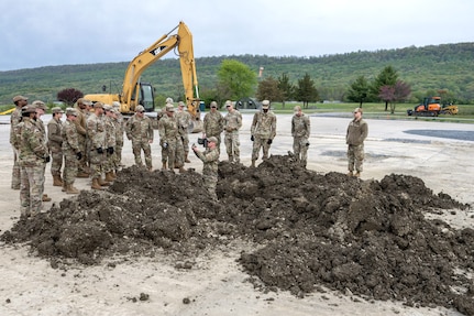 U.S. Air Force Airmen assigned to Joint Base Andrews, Maryland, conduct training for expeditionary airfield damage repair during the 316th Wing's Bivouac exercise at Fort Indiantown Gap, Pennsylvania, April 28, 2026. The exercise trains Airmen and highlights the diverse skill sets of multi-Air Force Specialty Code teamwork required to operate in a simulated contested environment. (U.S. Air Force photo by Staff Sgt. Aubree Owens)