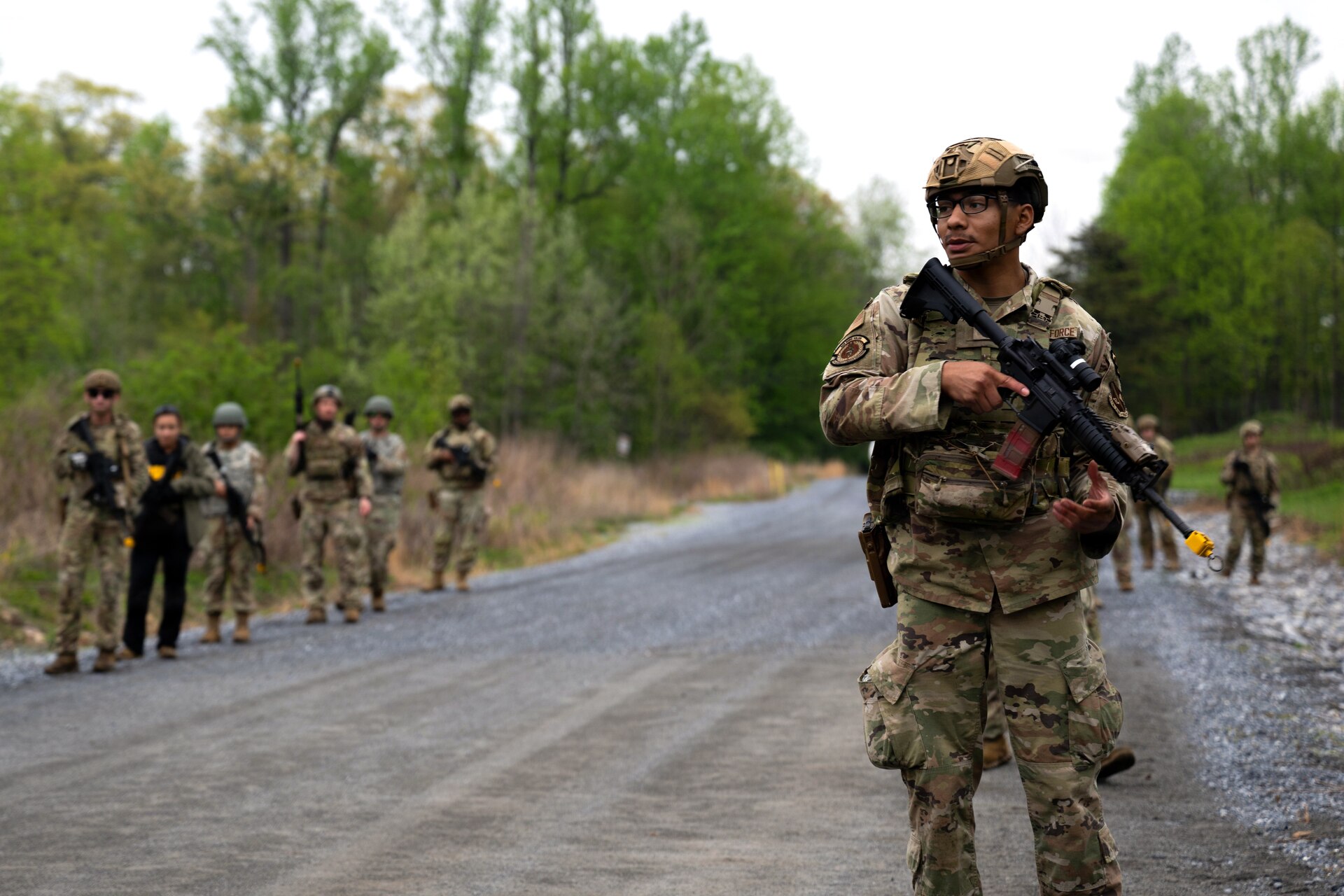 U.S. Airman 1st Class Gustavo Rubi-Vasquez, 316th Security Forces Squadron defender, participates in tactical maneuver drills during the 316th Wing’s Bivouac exercise at Fort Indiantown Gap, Pennsylvania, April 29, 2026. Members assigned to the 316th Security Forces Group and Air Force Office of Special Investigations Detachment 331 facilitated a convoy with augmentees from other career fields to provide training on securing positions, engaging adversaries and conducting site reconnaissance. (U.S. Air Force photo by Airman 1st Class Patrick Njuguna)