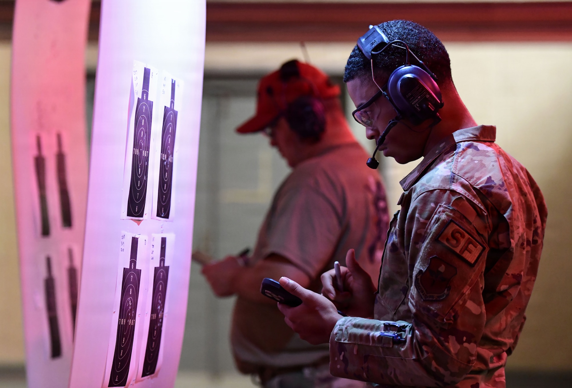 U.S. Airmen score shooting targets.
