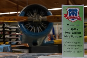 Trifold on desk in front of plane