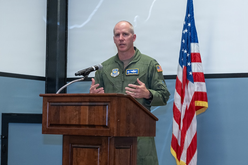 Col. Shroyer on stage, giving opening remarks