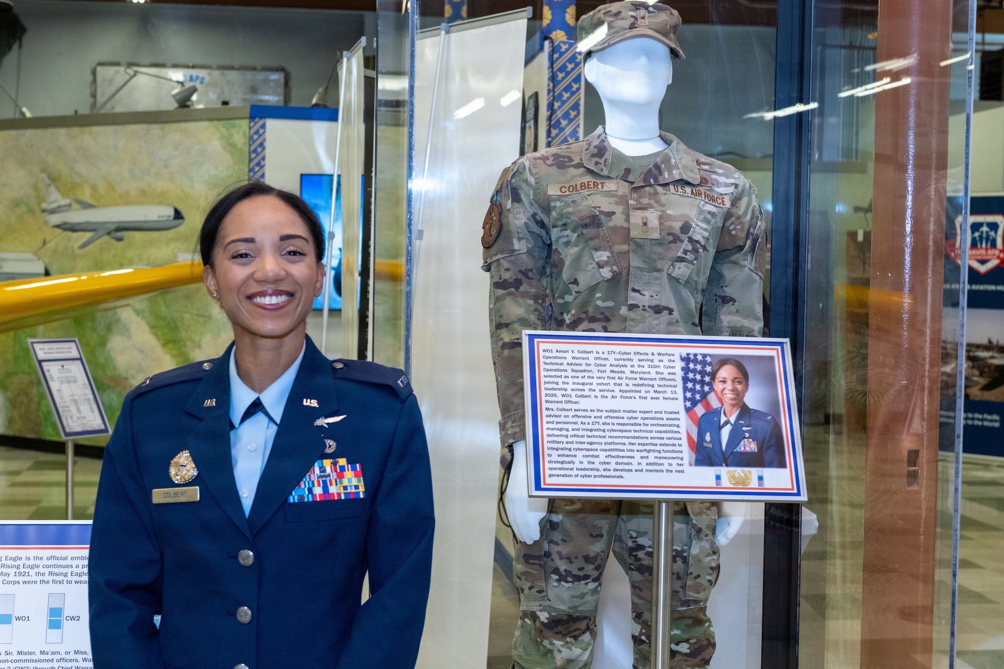 Woman Poses for photo with old uniform