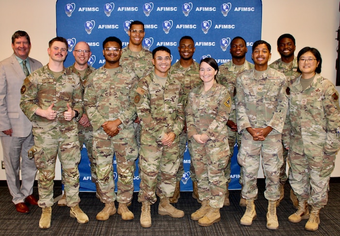 Finalist team members at the inaugural Air Force Installation and Mission Support Center Financial Management Innovation Rodeo held May 11, 2026, at Joint Base San Antonio gather for a group photo at the conclusion of the event.
