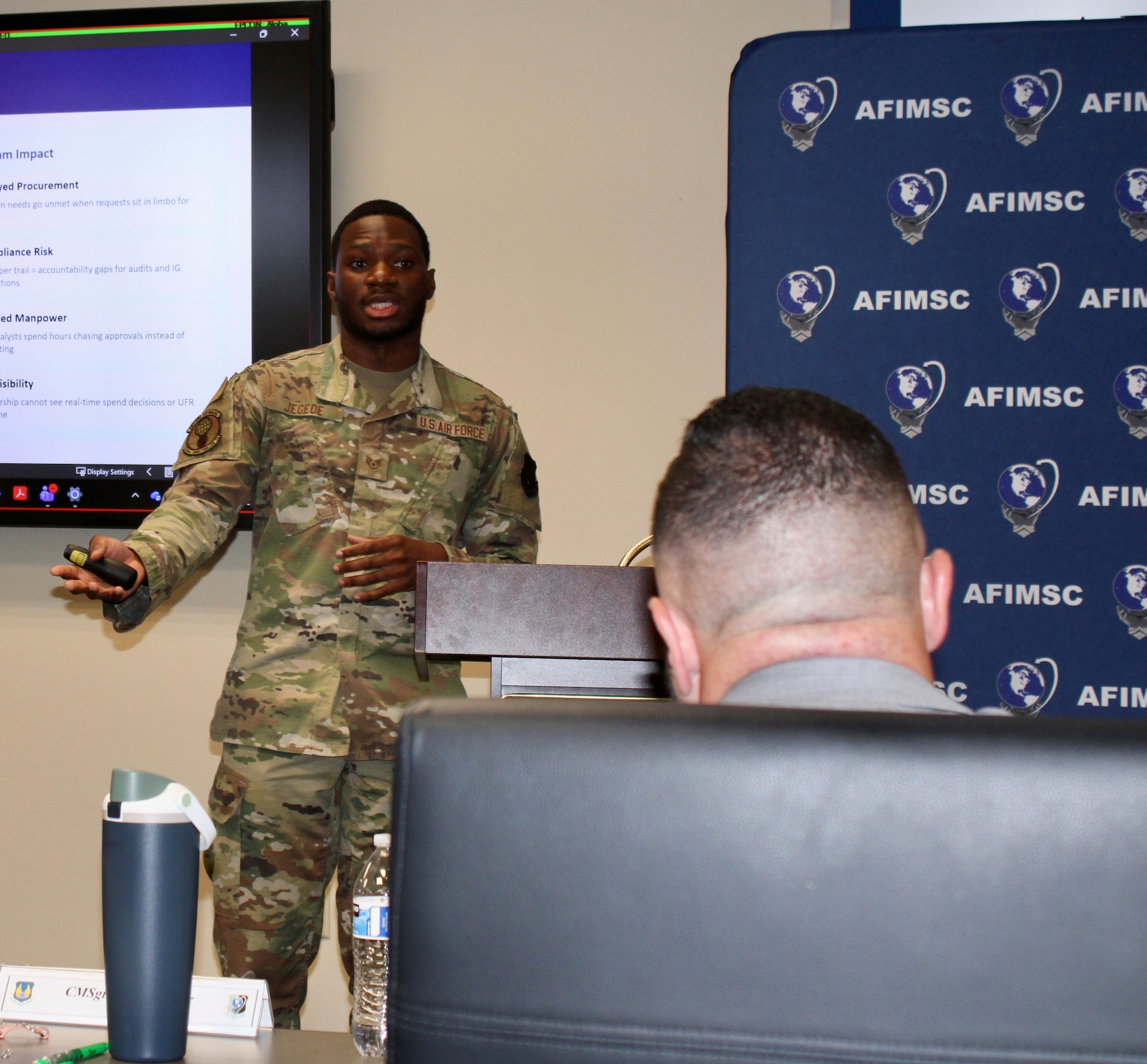 Staff Sgt. Donald Jegede, a financial analysis supervisor from the 355th Comptroller Squadron at Davis-Monthan Air Force Base, Arizona, pitches his team’s “Lightning FM” proposal at the inaugural Air Force Installation and Mission Support Center Financial Management Innovation Rodeo May 11, 2026, at Joint Base San Antonio, Texas.