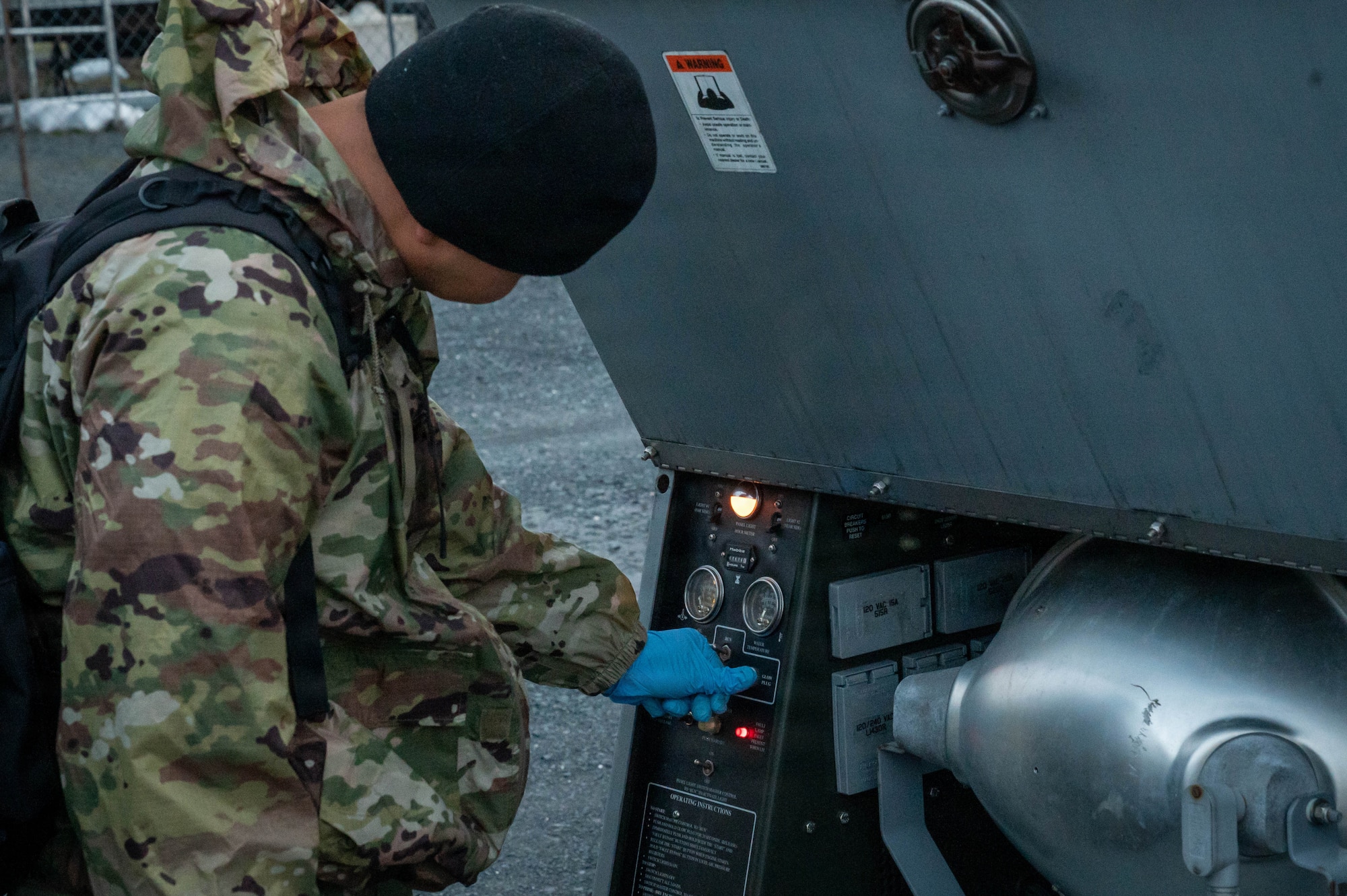 U.S. Air Force Airman 1st Class Nattapat Thawonjak, 773d Civil Engineer Squadron electrical power production journeyman, operates a generator during exercise Tropic Tundra 26 at Coast Guard Air Station Kodiak, Alaska, May 11, 2026.