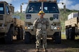 U.S. Army Reserve 2nd Lt. Jerrid Igisaiar, 368th Military Police Company officer in charge, 9th Mission Support Command, poses in front of a vehicle loaded with tent supplies and commodities to be delivered to residents as part of Typhoon Sinlaku recovery efforts in Saipan, Commonwealth of the Northern Mariana Islands, May 18, 2026.