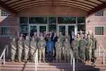 Members of the A4 Enterprise Council pose for a group photo on the steps of Air Force Installation and Mission Support Center headquarters building. A4EC is a collaboration forum for the Department of the Air Force’s senior logistics maintenance, engineering, and security forces leaders set to achieve Air Force strategic objectives. The 2026 Spring Enterprise Council met with the intent to reinforce an integrated understanding of preparations to defend the homeland and understand gaps and requirements to defend and fight from a contested homeland. (U.S. Air Force photo by Craig Z. Rodarte)