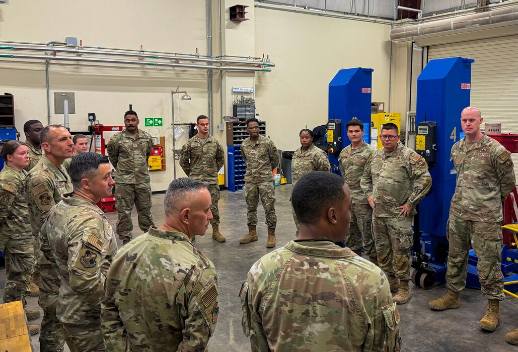 The 406th Air Expeditionary Wing command team engages with 726th Air Mission Support Squadron Airmen during an immersion tour at Camp Lemonnier, Djibouti, April 11, 2026. The mission of the 776th EMMS is to enable mission success through agile, reliable support, anytime, anywhere. (U.S. Air Force photo by Tech. Sgt. Jariel Quintana-Contreras)