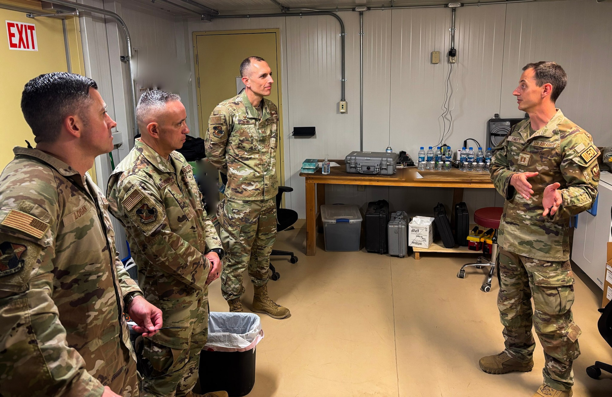 The 406th Air Expeditionary Wing command team receives a briefing from the 776th Expeditionary Air Base Squadron Medical Flight during an immersion tour at Chabelley Air Field, Djibouti, April 11, 2026. The mission of the 776th EABS is to provide airpower from a secure, durable and flexible installation. (U.S. Air Force photo by Capt. Sarah Cap)