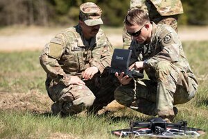 U.S. Army Capt. Harold McMurrin, commander, right, and Staff Sgt. Jayson Amoros, drone operator, left, assigned to “Demon” Battery, Field Artillery Squadron, 2nd Cavalry Regiment familiarize with the Parrot ANAFI controller during Saber Strike on May 2, 2026 at Bemowo Piskie Training Area, Poland. From April 27 to May 31, 2026 U.S. and Allied forces will exercise NATO’s Eastern Flank Deterrence Initiative, demonstrating NATO’s ability to fight and win on the modern battlefield. Nearly 15,000 troops from eleven nations will train across the High North, Baltic region, and Poland, executing rapid maneuvers, air defense, counter-drone operations, and cyber defense to validate NATO’s regional defense plans in real time. This series of linked exercises, including Saber Strike, Immediate Response, and Swift Response, turns investment into capability. Soldiers integrate unmanned systems, AI-enabled command and control, and live data networks to move faster, decide faster, and fight more effectively across all domains. Sword 26 demonstrates how U.S. Army Europe and Africa drives transformation at scale while strengthening deterrence. Together with our Allies, we are building a unified, lethal force ready to defend NATO territory and respond to any threat. (U.S. Army Reserve photo by Staff Sgt. Emilie Lenglain)