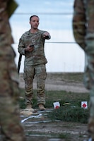 U.S. Army Capt. Harold McMurrin, commander, “Demon” Battery, Field Artillery Squadron, 2nd Cavalry Regiment, indicates where the unmanned aerial systems will be utilized during prerehearsal for the Combined Arms Rehearsal part of the Saber Strike exercise on May 4, 2026 at Bemowo Piskie Training Area, Poland. From April 27 to May 31, 2026 U.S. and Allied forces will exercise NATO’s Eastern Flank Deterrence Initiative, demonstrating NATO’s ability to fight and win on the modern battlefield. Nearly 15,000 troops from eleven nations will train across the High North, Baltic region, and Poland, executing rapid maneuvers, air defense, counter-drone operations, and cyber defense to validate NATO’s regional defense plans in real time. This series of linked exercises, including Saber Strike, Immediate Response, and Swift Response, turns investment into capability. Soldiers integrate unmanned systems, AI-enabled command and control, and live data networks to move faster, decide faster, and fight more effectively across all domains. Sword 26 demonstrates how U.S. Army Europe and Africa drives transformation at scale while strengthening deterrence. Together with our Allies, we are building a unified, lethal force ready to defend NATO territory and respond to any threat. (U.S. Army Reserve photo by Staff Sgt. Emilie Lenglain)