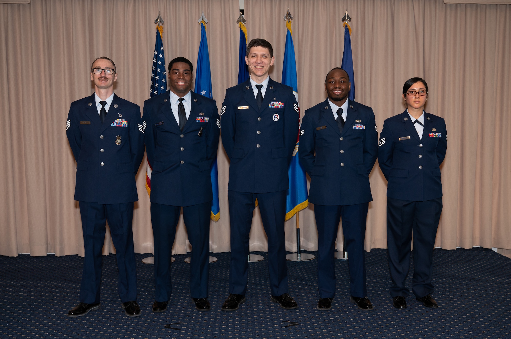 Image of five Airmen