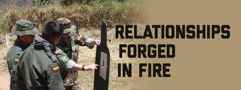 Banner Image for Relationships Forged in Fire. A Green Beret advises Colombian National Police Carabineros on basic rifle marksmanship at the International Police Training School of Colombia in 2009. Photo credit: CW4 W. Bryant"