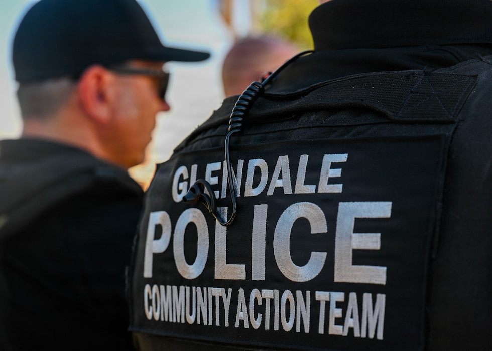 A member of the Glendale Police Department community action team attends the closing ceremony for 2026 Police Week held at Luke Air Force Base, Arizona, May 15, 2026. The event aligned with National Police Week 2026, an annual event observed by civilian and military law enforcement entities, to honor tradition, precision, and the spirit of service of law enforcement members in support of the partnerships and communities they serve. (U.S. Air Force photo by Staff Sgt. Magen M. Reeves)