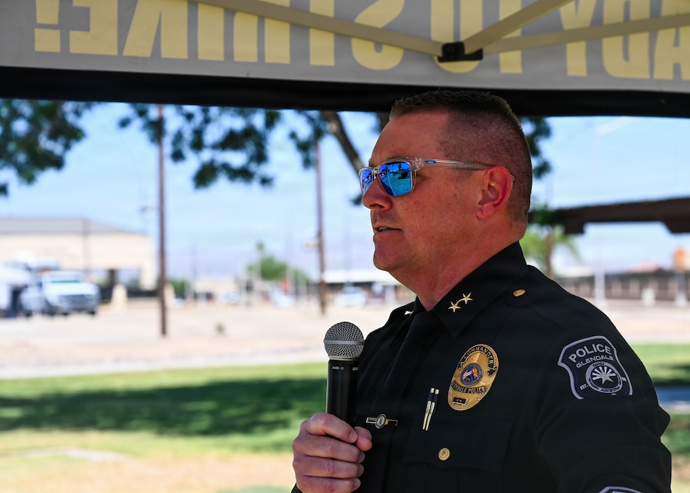 Jay O’Neill, Glendale Police Department special operations division commander, speaks at a closing ceremony for 2026 Police Week held at Luke Air Force Base, Arizona, May 15, 2026. O’Neill was invited to be the guest speaker for the ceremony in part due to his prior service as a U.S. Marine and long-standing career as a civilian law enforcement officer, embodying the unmatched spirit of service shared between Luke AFB and local community. (U.S. Air Force photo by Staff Sgt. Magen M. Reeves)
