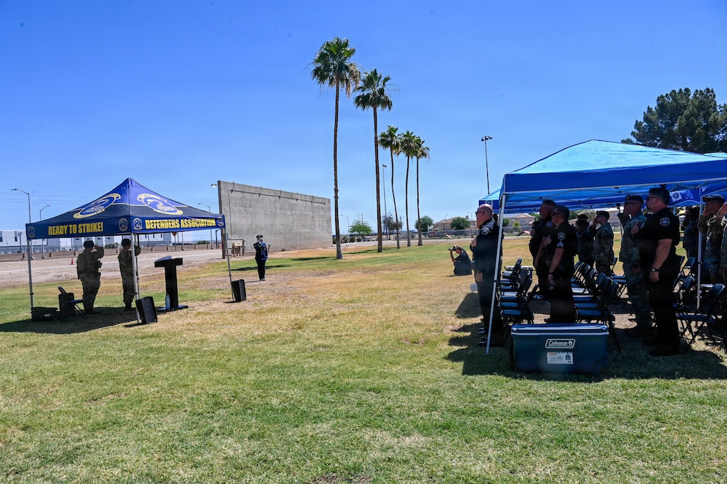 The 56th Security Forces Squadron hosts a closing ceremony for 2026 Police Week held at Luke Air Force Base, Arizona, May 15, 2026. Base personnel and members of local police were invited to attend the ceremony which honored tradition, precision, and the spirit of service of law enforcement members in support of the partnerships and communities they serve. (U.S. Air Force photo by Staff Sgt. Magen M. Reeves)