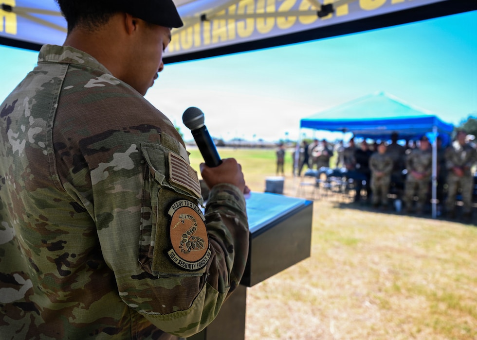 U.S. Air Force Senior Airman Isaia Lopez, 56th Security Forces Squadron master of ceremonies, speaks during a closing ceremony for 2026 Police Week held at Luke Air Force Base, Arizona, May 15, 2026. The ceremony honored the sacrifices of both civilian and military law enforcement personnel, highlighting the discipline, integration, and lethality of military law enforcement officers in support of the nation’s defense posture and projection of the global strategic mission. (U.S. Air Force photo by Staff Sgt. Magen M. Reeves)