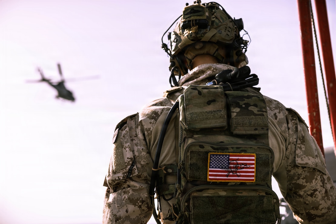 U.S. Marines with Maritime Raid Force, 31st Marine Expeditionary Unit, conduct fast rope training aboard the forward-deployed amphibious assault ship USS Tripoli (LHA 7) in the U.S. Central Command area of responsibility, April 14, 2026. (U.S. Marine Corps photo)