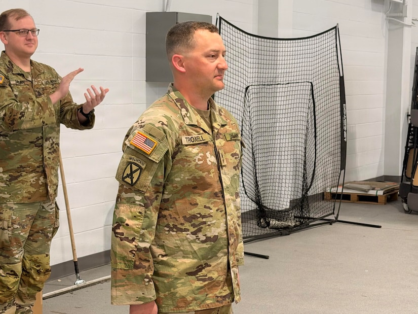 U.S. Army Master Sgt. James Troxell of Bravo Battery, 1st Battalion, 623rd Field Artillery, is congratulated by his unit after being promoted in Monticello, Kentucky, April 14, 2026.