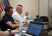 AMLC team member speaks during training event.