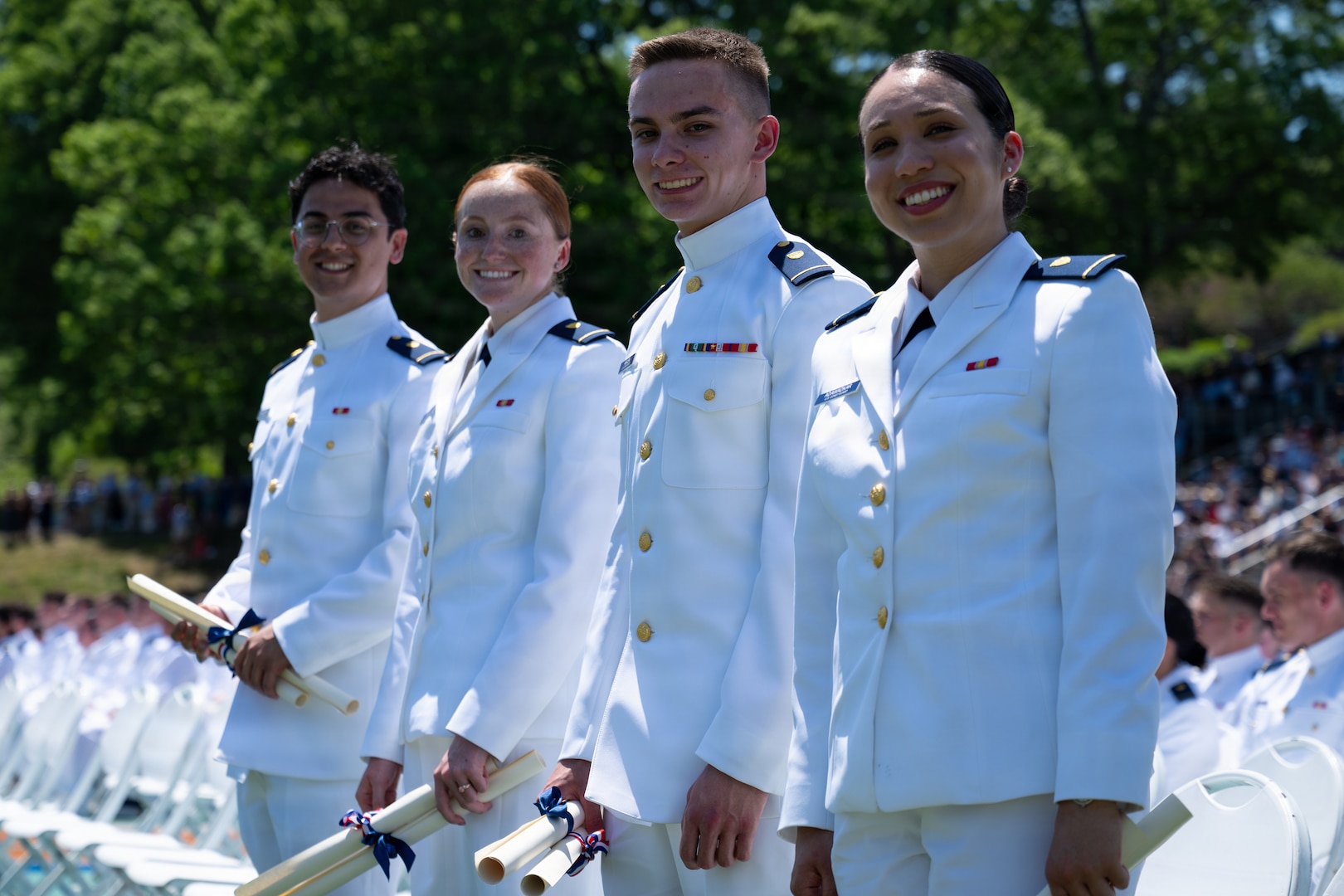 U.S. Coast Guard Academy (USCGA) cadets smile during the 145th Commencement Exercises at the Coast Guard Academy, New London, Connecticut, May 20, 2026. The cadets earn their commission and degree during the ceremonies. (U.S. Coast Guard photo by Petty Officer 3rd Class Rajesh Harrilal)