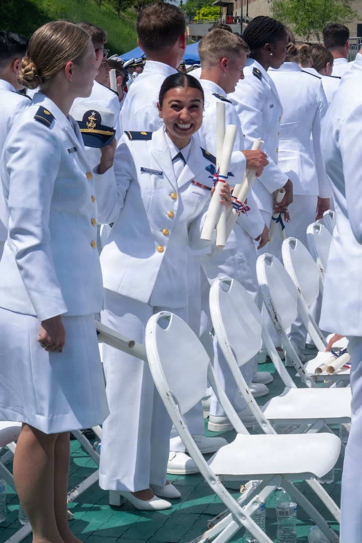 A U.S. Coast Guard Academy (USCGA) cadet poses for a photo during the 145th Commencement Exercises at the Coast Guard Academy, New London, Connecticut, May 20, 2026. Cadets go through a 200 week course to become commissioned officers. (U.S. Coast Guard photo by Petty Officer 3rd Class Rajesh Harrilal)