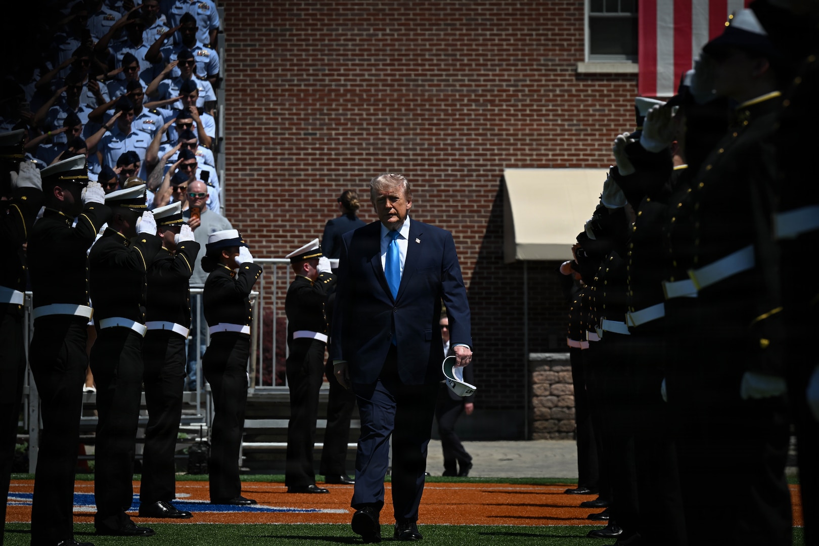 President Donald J. Trump walks through a cordon during the U.S. Coast Guard Academy’s 145th commencement exercises in New London, Connecticut, May 20, 2026. The commencement ceremony celebrated the Class of 2026 as graduates received commissions as officers in the U.S. Coast Guard. (U.S. Coast Guard photo by Petty Officer 3rd Class Lyric Jackson)