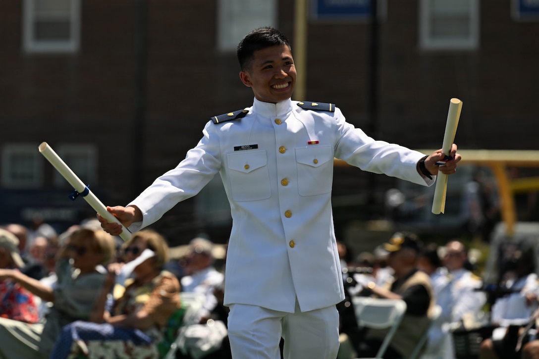 U.S. Coast Guard Academy Cadet 1st Class Alexander Beato walks across the stage during the academy’s graduation ceremony in New London, Connecticut, May 20, 2026.  Graduates from the Class of 2026 go on to serve at various U.S. Coast Guard units. (U.S. Coast Guard photo by Petty Officer 3rd Class Lyric Jackson)