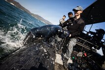 U.S. Navy Diver 1st Class Benjamin Guerra, assigned to Navy Mobile Diving and Salvage Unit 1, climbs into a rigid-hulled inflatable boat after locating a simulated sunken vessel during Salvage Exercise Korea 2026 at Jinhae Naval Base, Republic of Korea, April 7, 2026. Commander, Logistics Group Western Pacific/Task Force 73 sustains the U.S. Navy’s maritime forces and is responsible for all diving and salvage operations in the Western Pacific in support of a free and open Indo-Pacific. (U.S. Navy photo by Mass Communication Specialist 2nd Class Jordan Jennings)