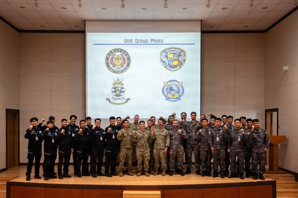 Members of the Republic of Korea (ROK) Coast Guard Special Rescue Unit, U.S. Navy Mobile Diving and Salvage Unit 1, Australian Clearance Diving Team 1, and the ROK Ship Salvage and Rescue Unit, meet for Salvage Exercise Korea 2026 at Jinhae Naval Base, Republic of Korea, April 6, 2026. Commander, Logistics Group Western Pacific/Task Force 73 sustains the U.S. Navy’s maritime forces and is responsible for all diving and salvage operations in the Western Pacific in support of a free and open Indo-Pacific. (U.S. Navy photo by Mass Communication Specialist 2nd Class Jordan Jennings)