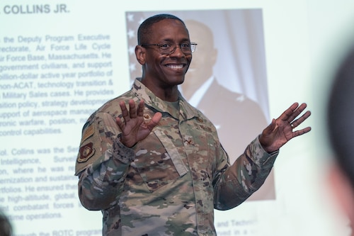 Colonel speaking to crowd