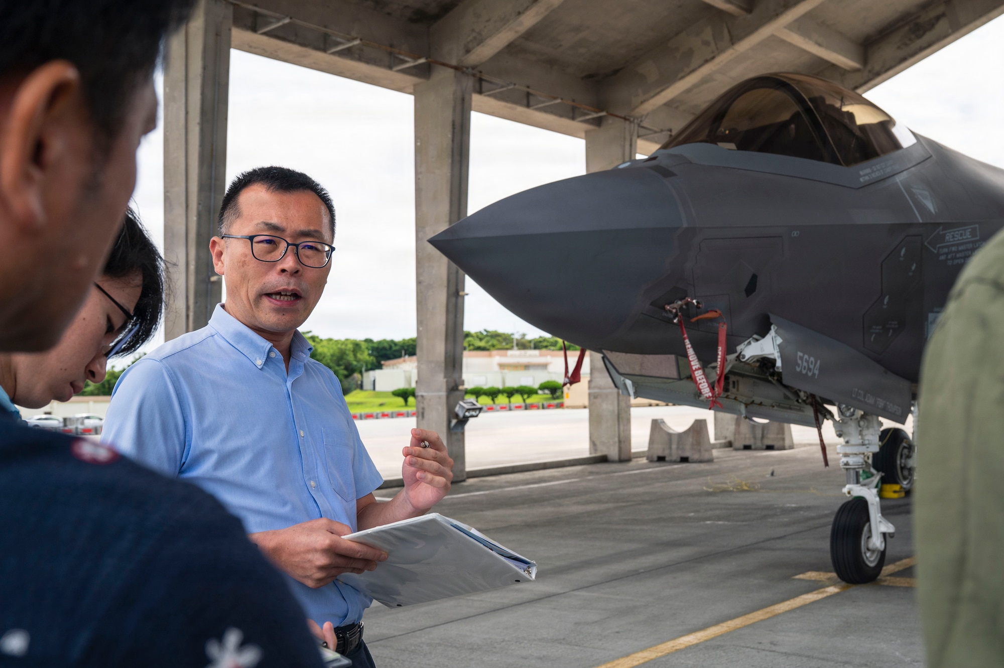 Members of the division toured an F-22 Raptor and F-35 Lightning II static display, where they learned about advanced aerial tactics as well as noise reduction techniques that pilots use on Okinawa to be considerate of residents.  (U.S. Air Force photo by Senior Airman James Johnson)