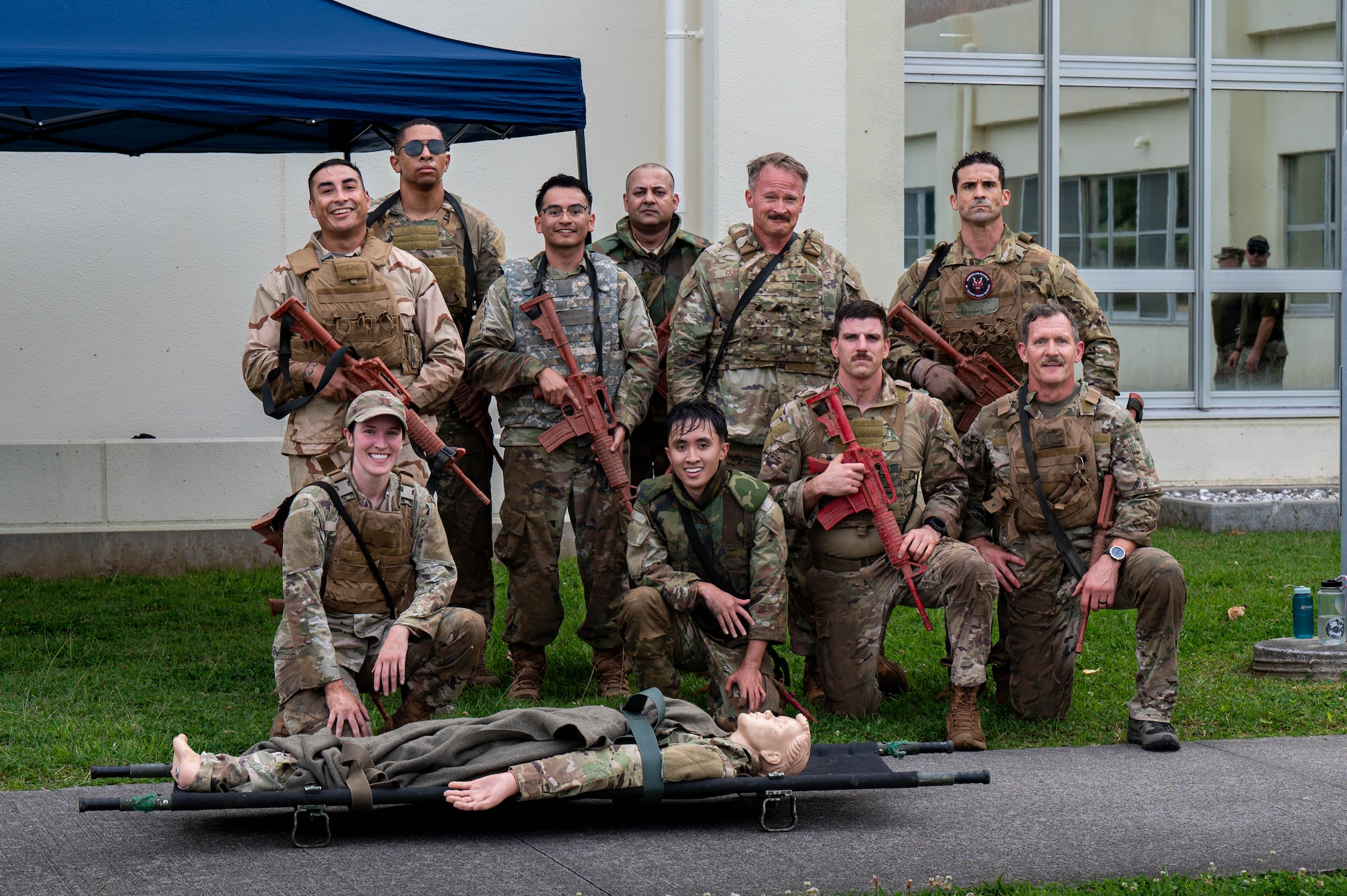 The U.S. Air Force 18th Wing command team poses for a photo after participating in the Combat Readiness Challenge at Kadena Air Base, Japan, May 15, 2026. The event served as an opportunity for leadership to engage directly with Airmen while promoting a culture centered on resilience and warrior ethos. (U.S. Air Force photo by Airman 1st Class Nathaniel Jackson)