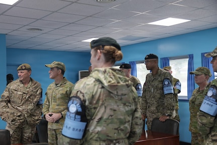 The Chiefs of Army and their senior enlisted leaders tour one of the blue “Conference Row” buildings inside the Joint Security Area. The visit is part of a strategic engagement hosted by LTGEN Winter for Chiefs of Army and Sergeants Major from Australia, Canada, New Zealand, and the United Kingdom on April 22, 2026.