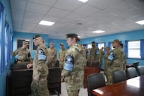 The Chiefs of Army and their senior enlisted leaders tour one of the blue “Conference Row” buildings inside the Joint Security Area during their visit. The tour is part of a strategic engagement hosted by LTGEN Winter for Chiefs of Army and Sergeants Major from Australia, Canada, New Zealand, and the United Kingdom on April 22, 2026.