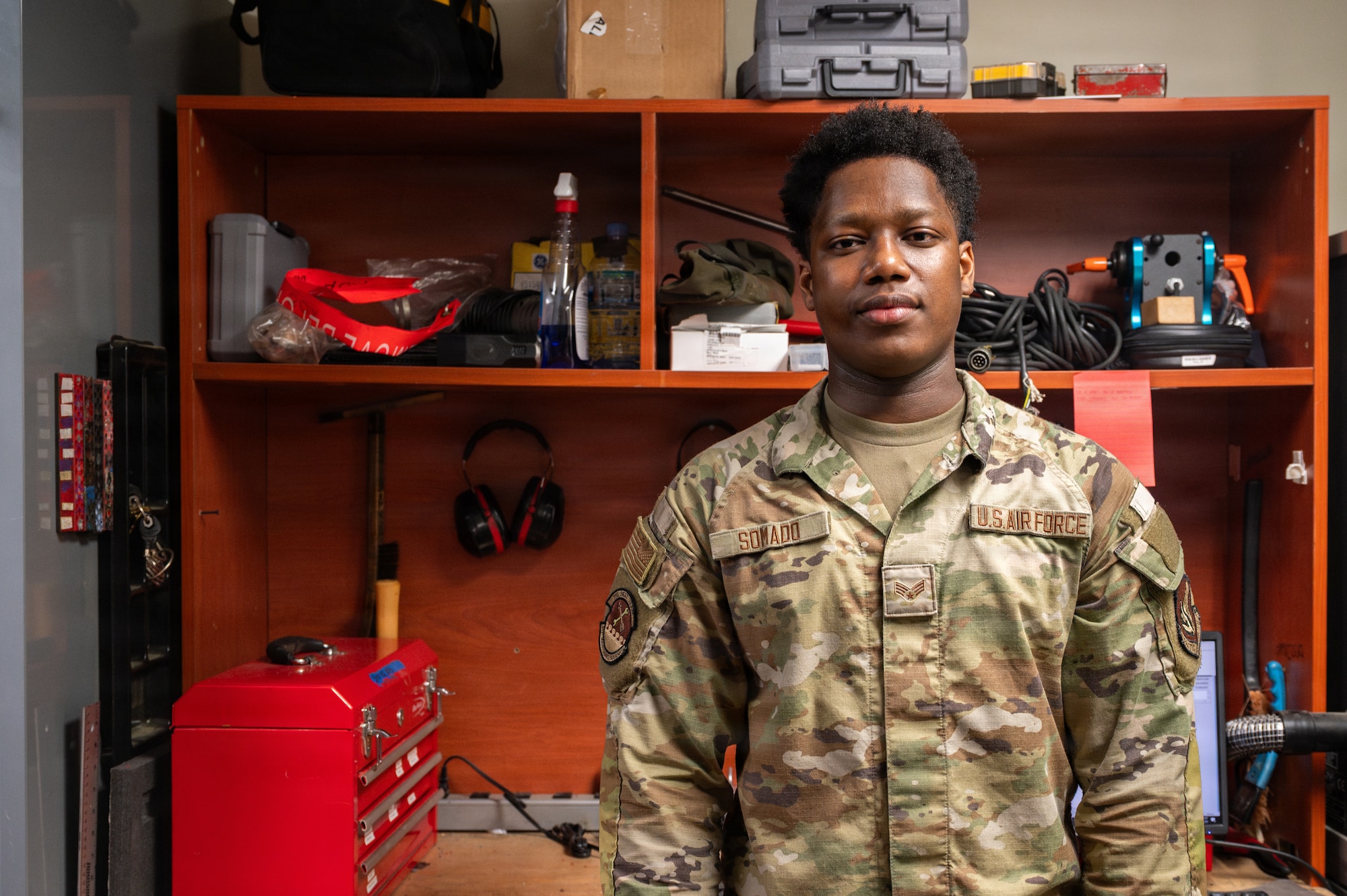 An Airman poses for a photo.