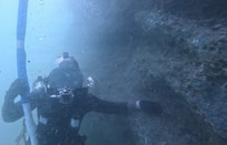 U.S. Navy Seabee divers, assigned to Underwater Construction Team (UCT) 1, Construction Dive Detachment Charlie (CDD/C), conduct infrastructure repairs and assessments at the Port Brizine fuel terminal to restore structural integrity to a critical maritime refueling facility in Split, Croatia, April 27, 2026.