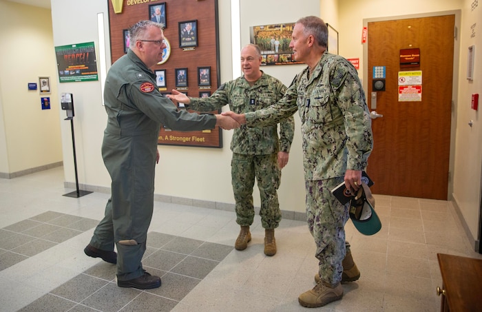 Vice Adm. Mike Vernazza, Commander, Naval Information Forces, was welcomed by Rear Adm. Kenneth Blackmon, Vice Commander, U.S. Fleet Forces Command, and Rear Adm. Jason Naidyhorski, Vice Commander, U.S. Sixth Fleet and Director, Maritime Partnership Program, U.S. Sixth Fleet at Navy Warfare Development Center (NWDC) during the 2026 MAKO Storm event in Norfolk, Virginia, on May 15, 2026.