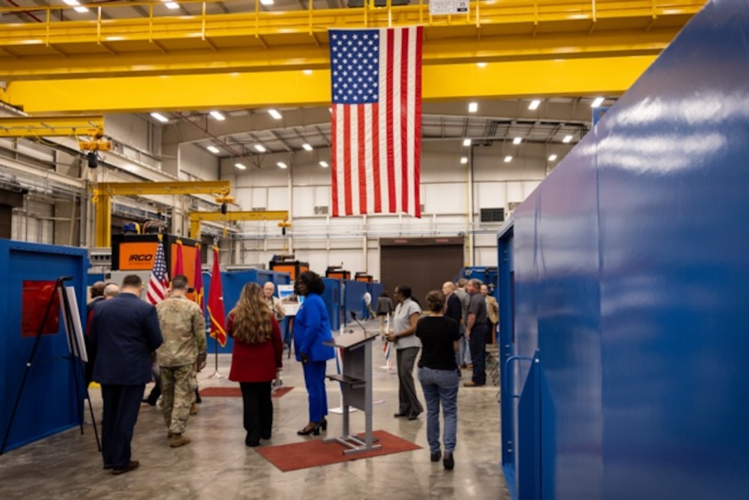 Picture of people at a ribbon cutting.