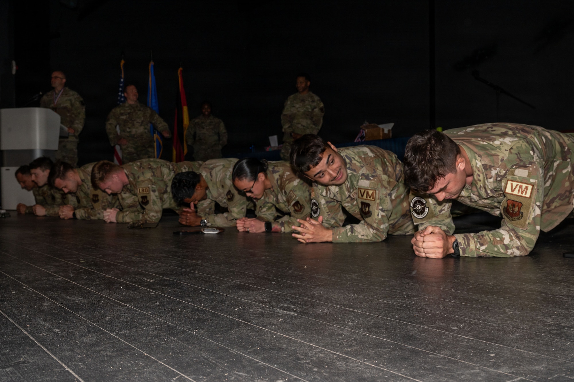 U.S. Airmen are challenged to a plank competition to conclude the 86th Logistics Readiness Group Annual Awards at Ramstein Air Base, Germany, May 18, 2026.