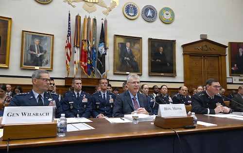DAF senior leaders speak during a hearing.