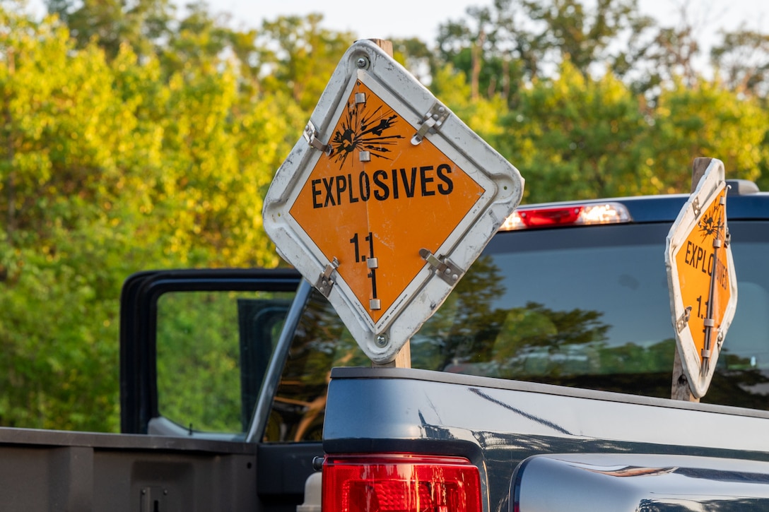 Truck with explosive signs