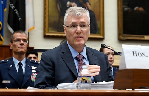 DAF senior leaders speaking during a hearing.