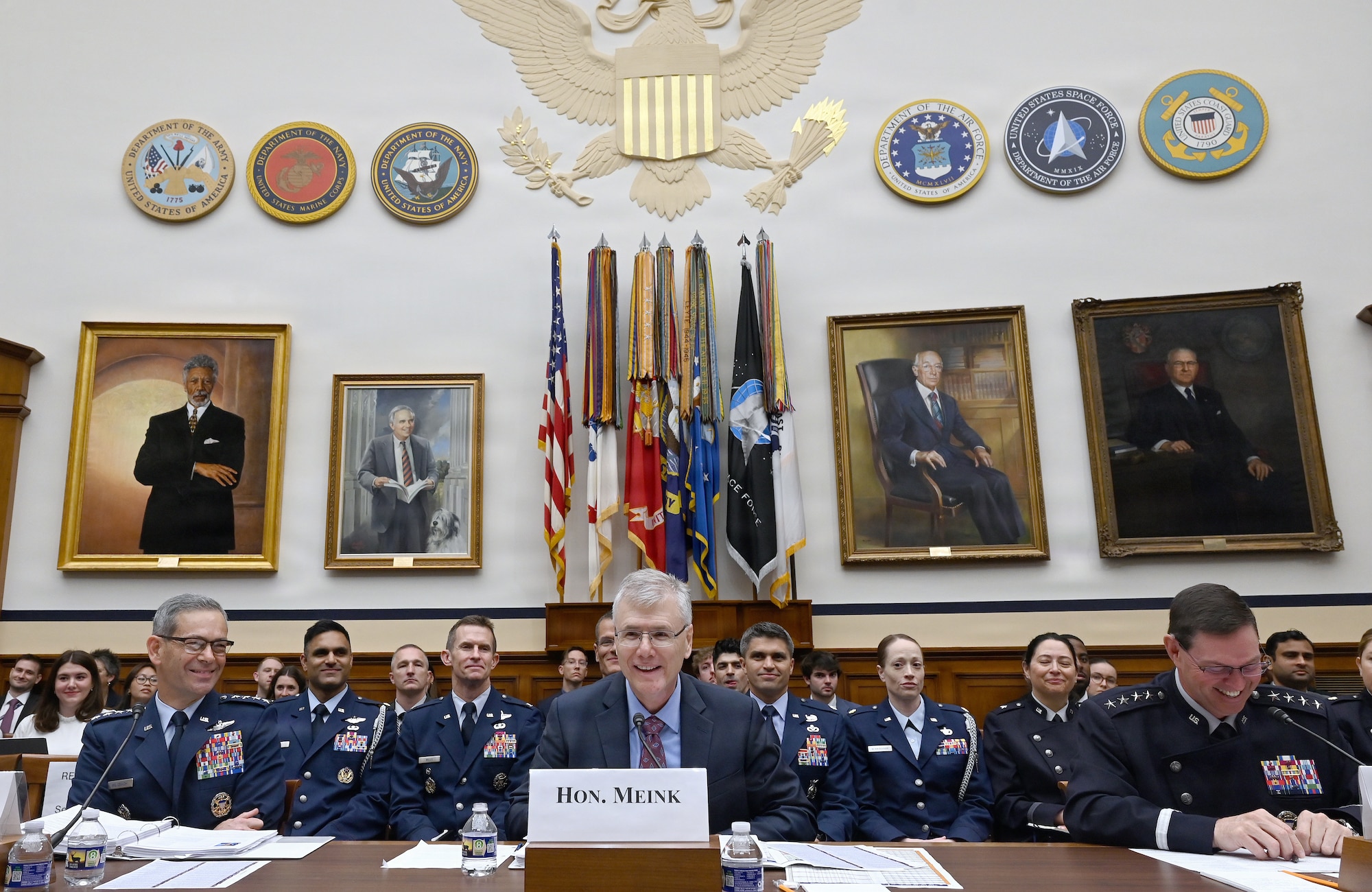 DAF senior leaders speaking during a hearing.