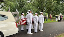 Sailors from the Navy Reserve Center Indianapolis and Naval Station Great Lakes carry the casket of Seaman 1st Class Wayne Edward Newton at Grandview Cemetery in Terre Haute, Ind., on May 16, 2026. 

Newton was killed in action on Dec. 7, 1941, during the attack on Pearl Harbor, while serving on USS California (BB-44), a Tennessee-class battleship. Newton’s remains were recently identified by the Defense POW/MIA Accounting Agency as part of the USS California Project, a forensic research and recovery initiative aiming to identify 25 previously unidentified Sailors and Marines killed in the attack. In the time-honored tradition of military funerals, Rear Adm. Michael Richman, the deputy Portfolio Acquisition Executive Strategic Systems Programs for regional deterrence, presented the folded American flag to Newton’s next of kin, his nephew Mr. Stephen Newton.